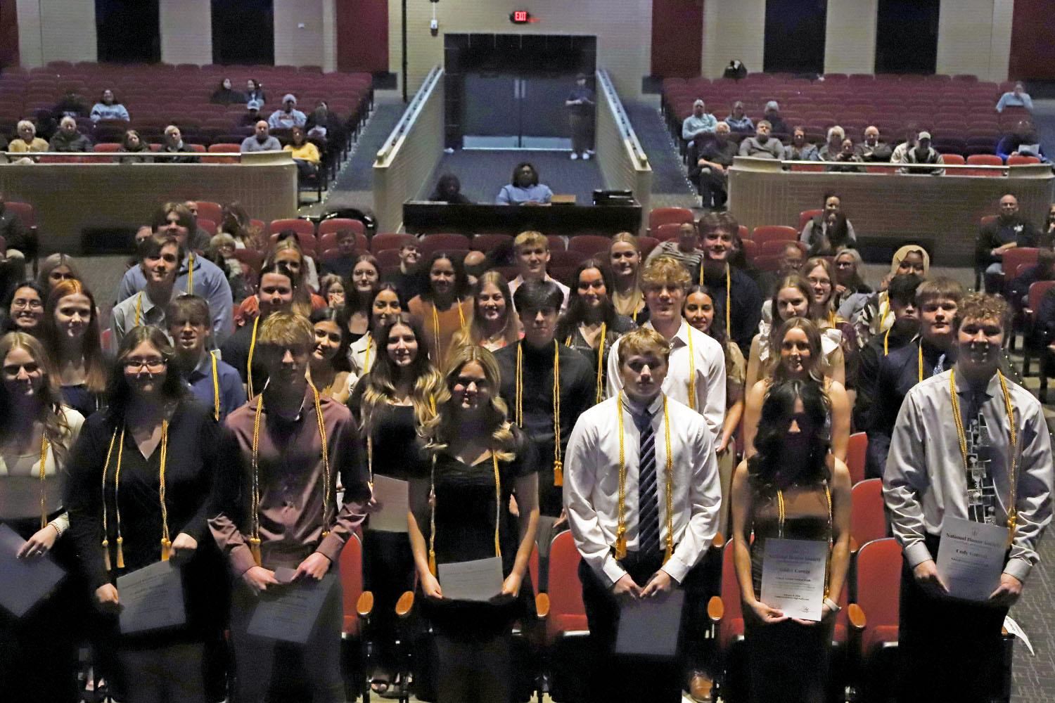 34 GISH Juniors smiling after being inducted into National Honor Society.